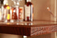 Artemis Croco Tall Leather Bar Tan